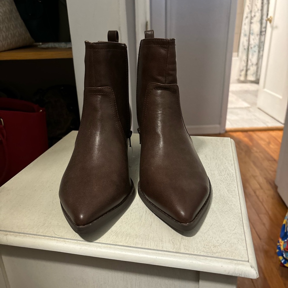 chic brown ankle boots. Perfect for any occasion, they offer comfort